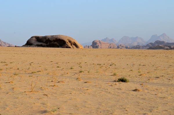 Wadi Rum, Jordan... the desert sand sits like a skull cap on massive stone structures here 