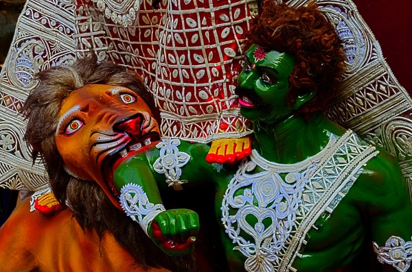 Durga Puja 2015. This lion is ferocious and the demon controlling a show of his fear...