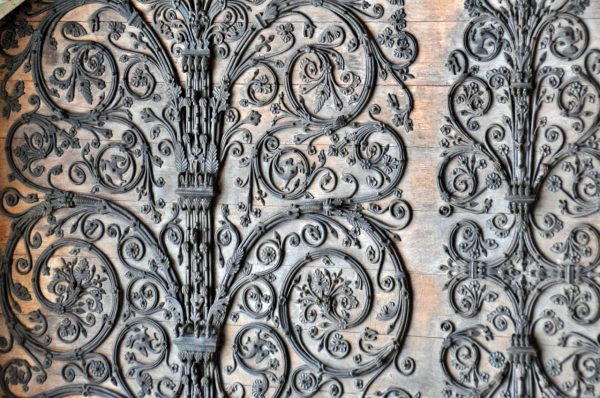 Close-up of one of the door exteriors. Notre-Dame Cathedral. Paris. 2014