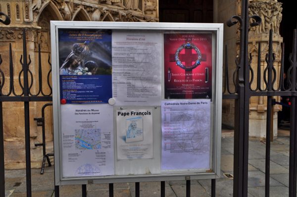The notice-board outside the cathedral. Paris. 2014