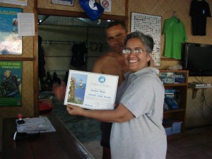 The Chief Diving Instructor gives Specky her well deserved certificate...