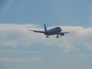 An aircraft flying in... captured from inside the plane as we sat waiting for the plane to taxi out...