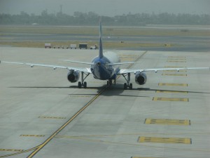 A lone plane about to begin its long journey can be such a poetic sight!