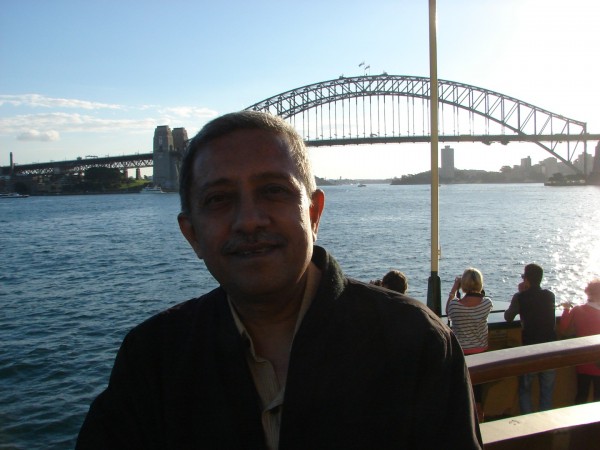 That's the Sydney Harbour Bridge behind me... and yes, it is possible to climb the arch of the bridge for a fee!