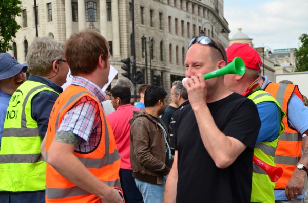 London Cab strike. 11 June 2014. Cab horns and vuvuzelas or the lepatata Mambu (its Tswana name), a plastic horn add to the impact!