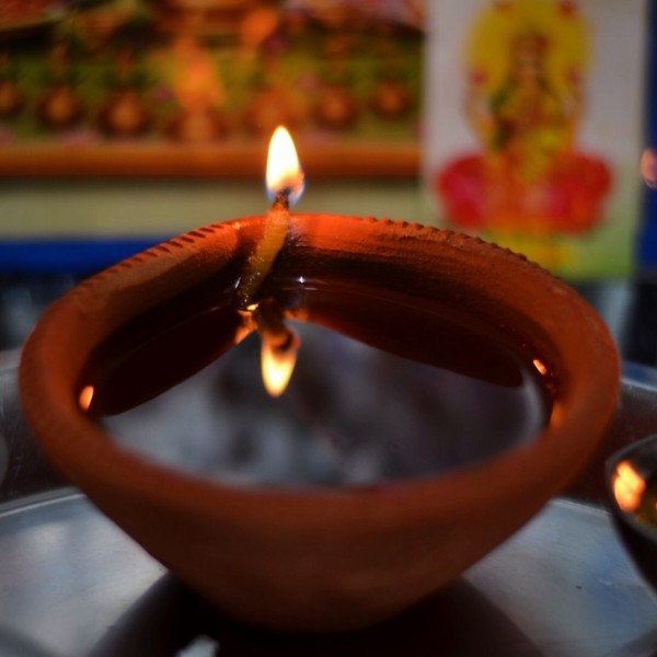 My Diwali 2014 photo-essay. Diwali pooja... and the lamp lighted. #GoddessLakshmi #Ganesha