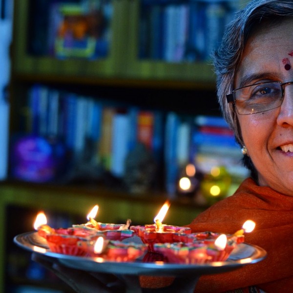 My Diwali 2014 photo-essay. Specky with the diyas...