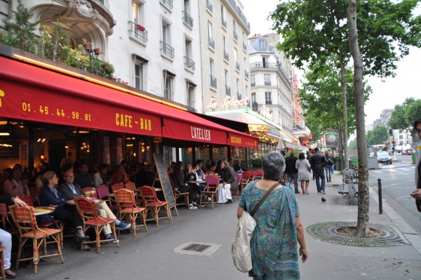 Even furniture arranged in a way that allows you to interact with a city has a dramatic edge to it. Picture clicked by me as we approached Le Select, a famous cafe in Paris