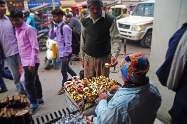 Vendors on the streets of Delhi - the brassware seller