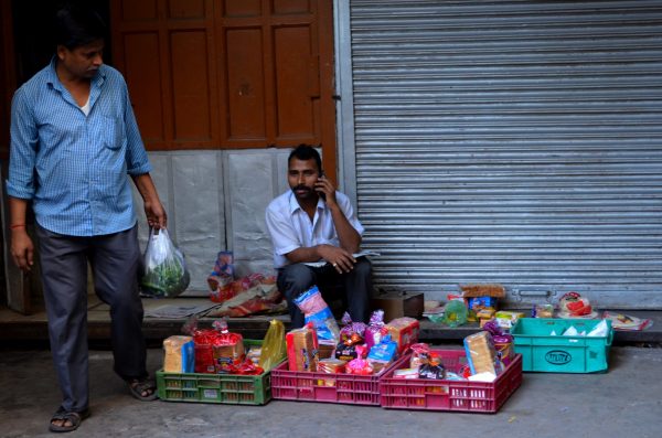 Vendors on the streets of Delhi - the early morning vendor who does business only until the shop opens