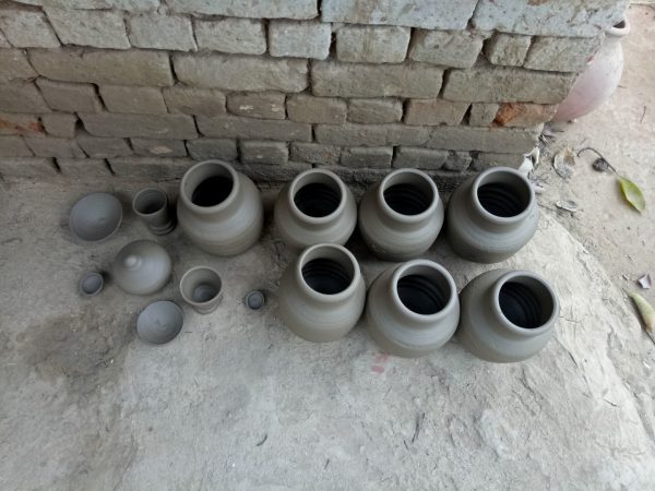 The semi-dry pots that can be beaten into a ghara...