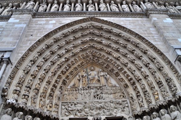 Close-up of the arch over the main entrance to the cathedral. Paris. 2014