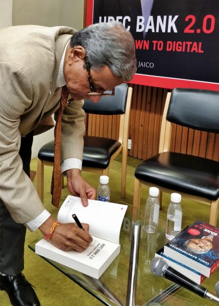 The author signing my copy - This book has the heart of a novel and the mind of an information treasure trove